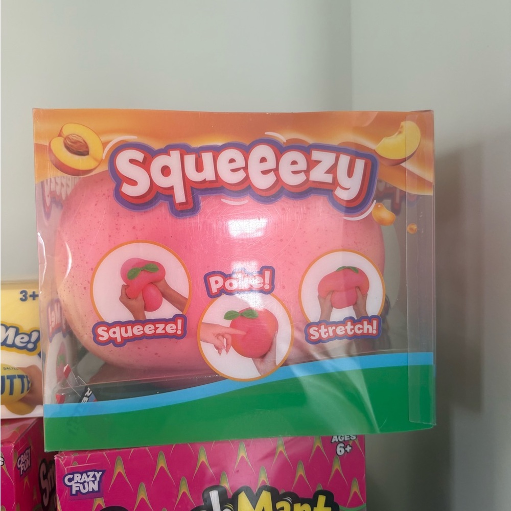 Squeeeezy Peach squish Brand new. Got from a bidding site & paid US ship, etc